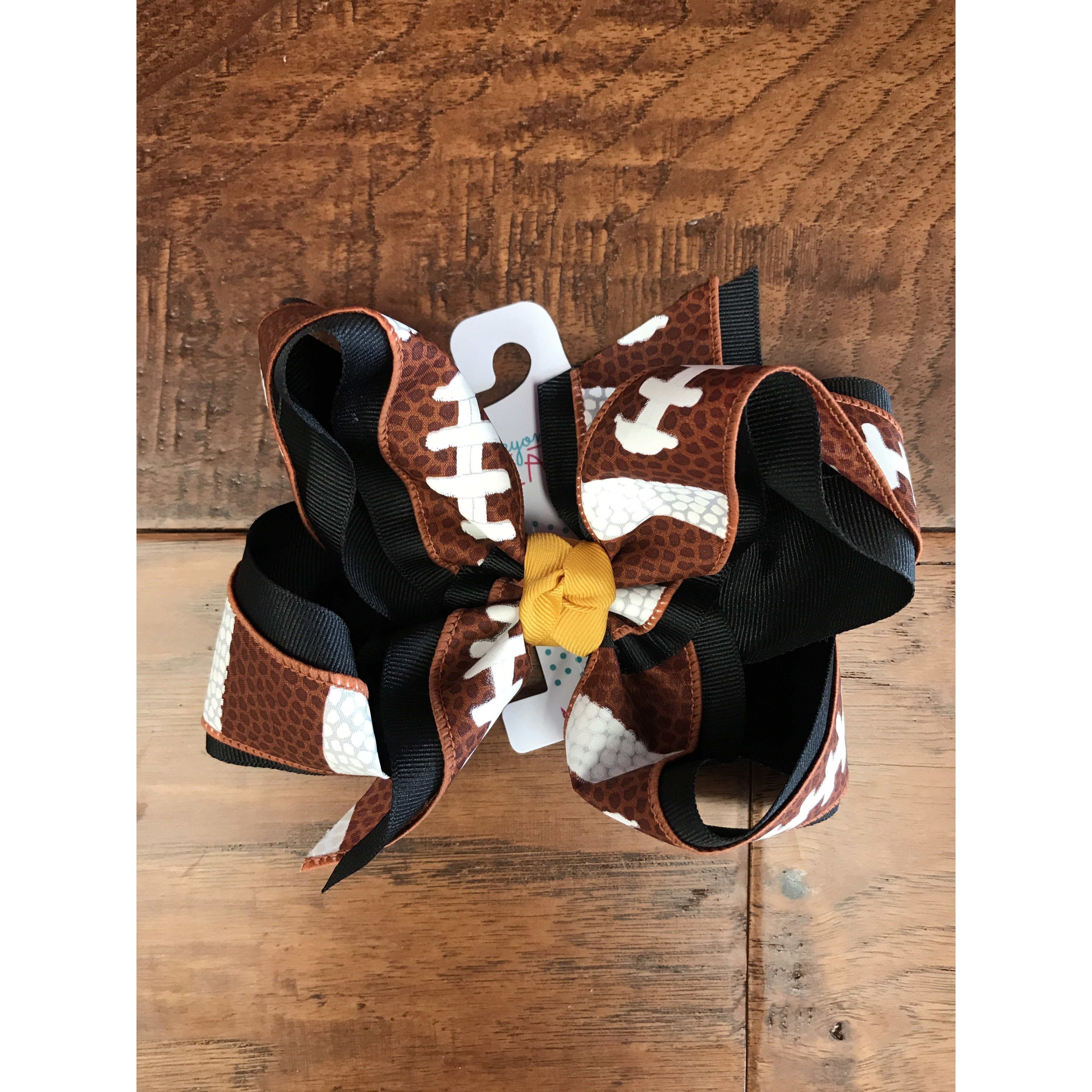 Beyond Creations Football Bow with Knot on French Clip in Assorted Colors