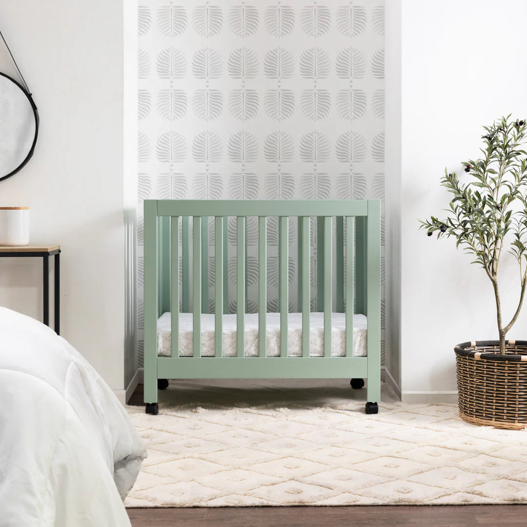Babyletto Light Sage Origami Portable Mini Crib for Modern Families