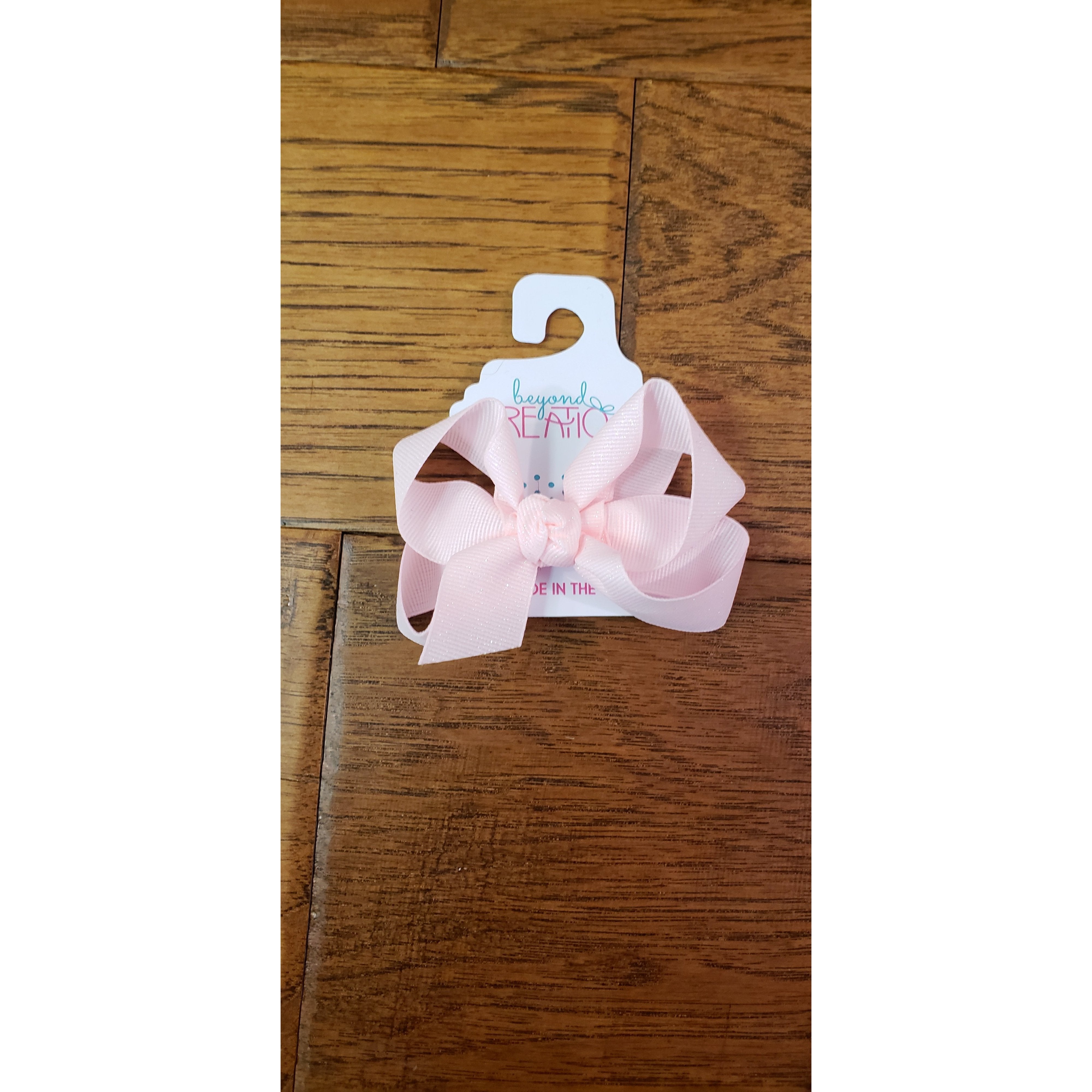 Medium-Sized Beyond Creations FDM Bow with Knot and Fairy Dust