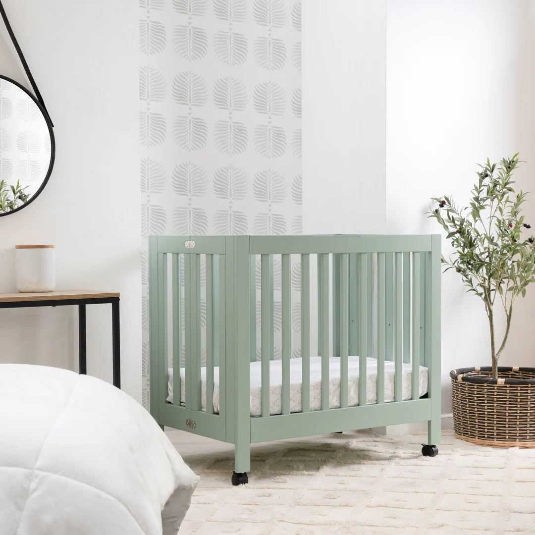 Babyletto Light Sage Origami Portable Mini Crib for Modern Families