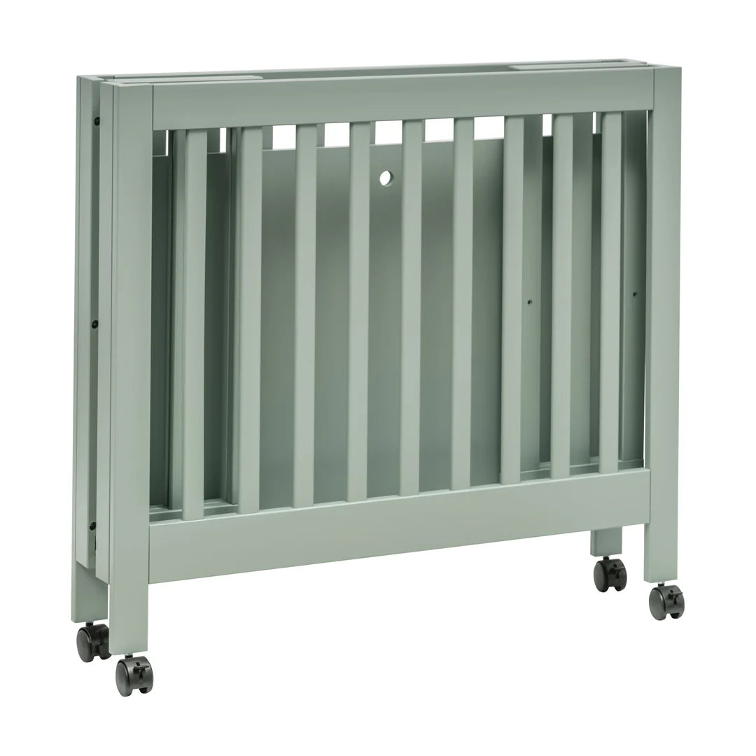 Babyletto Light Sage Origami Portable Mini Crib for Modern Families
