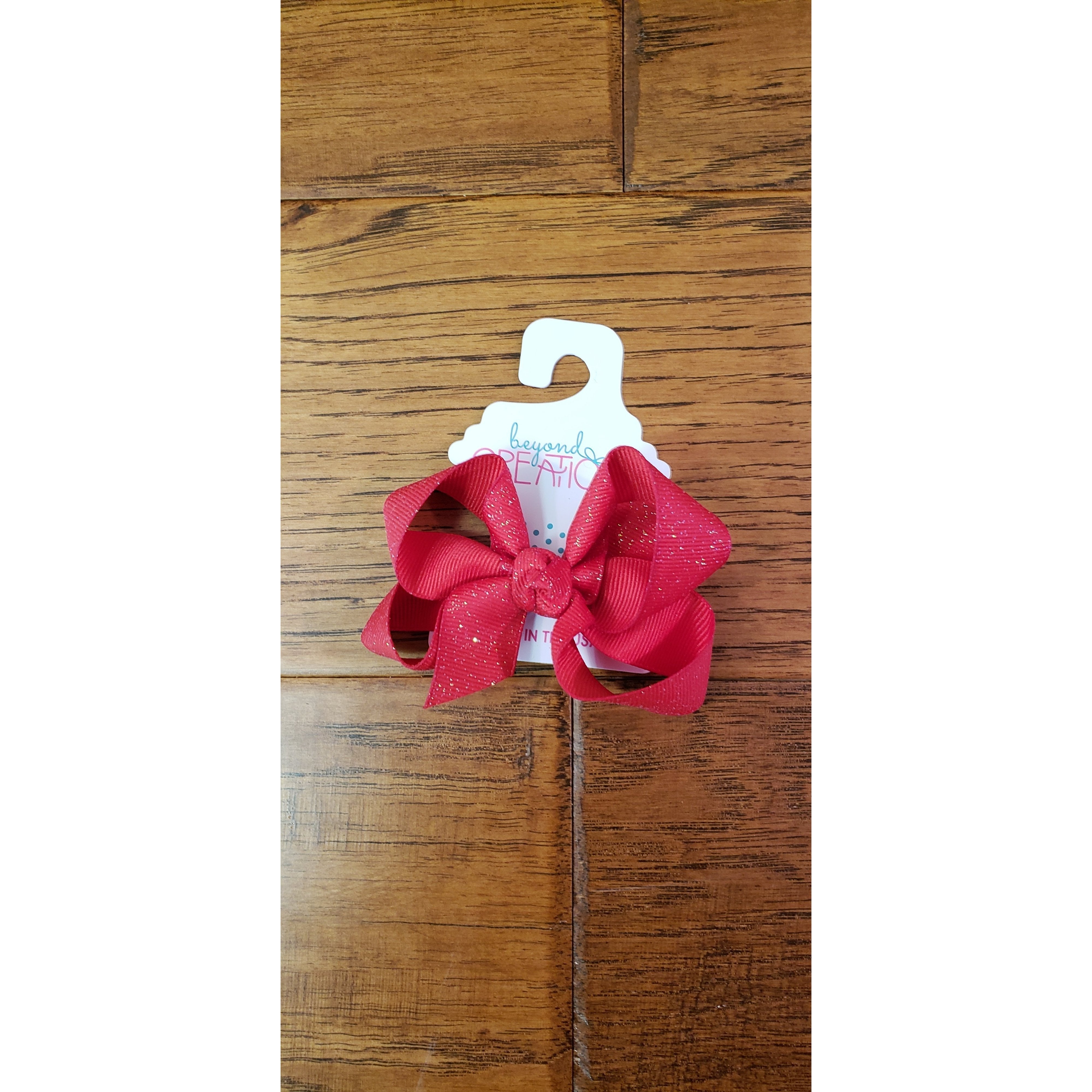 Medium-Sized Beyond Creations FDM Bow with Knot and Fairy Dust