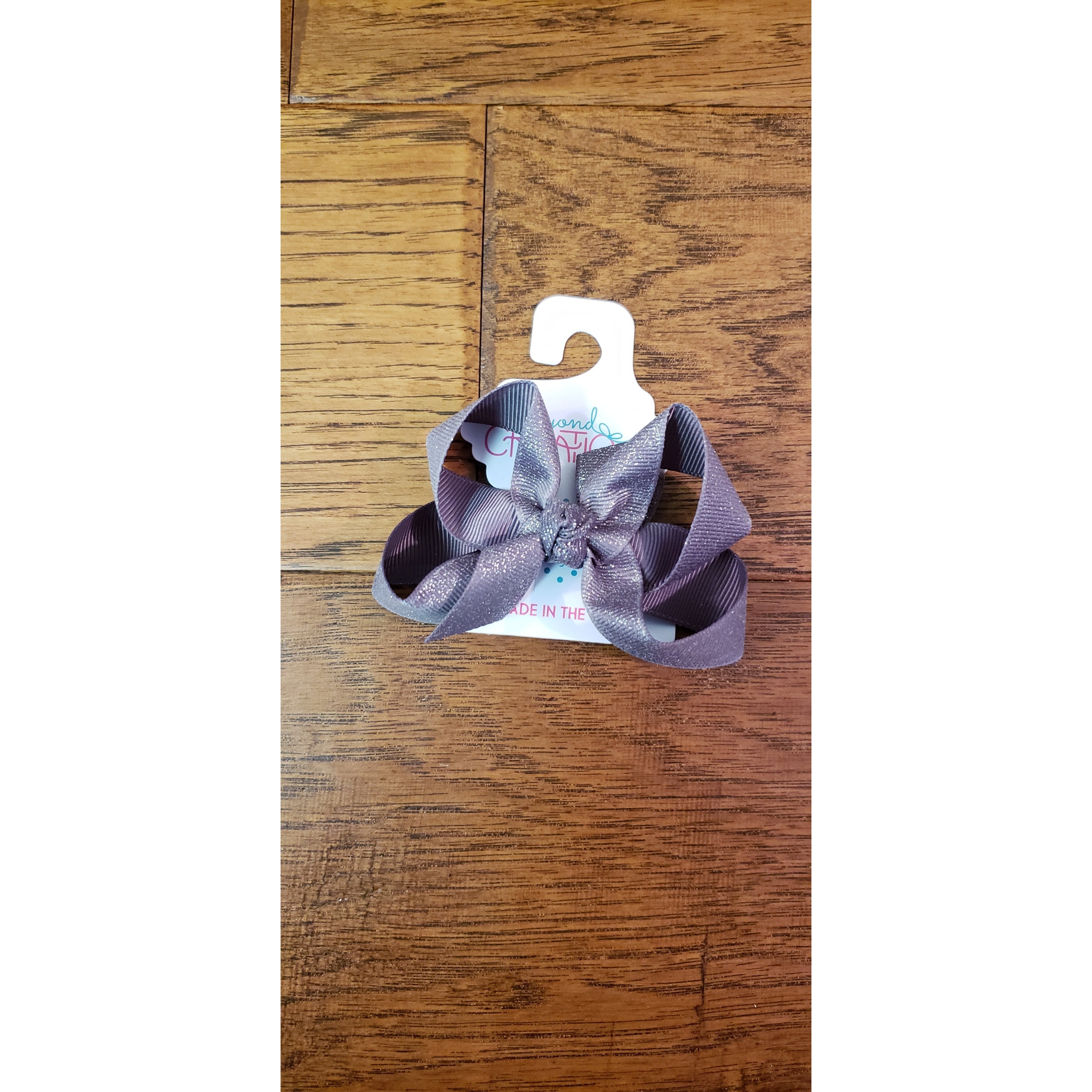 Medium-Sized Beyond Creations FDM Bow with Knot and Fairy Dust