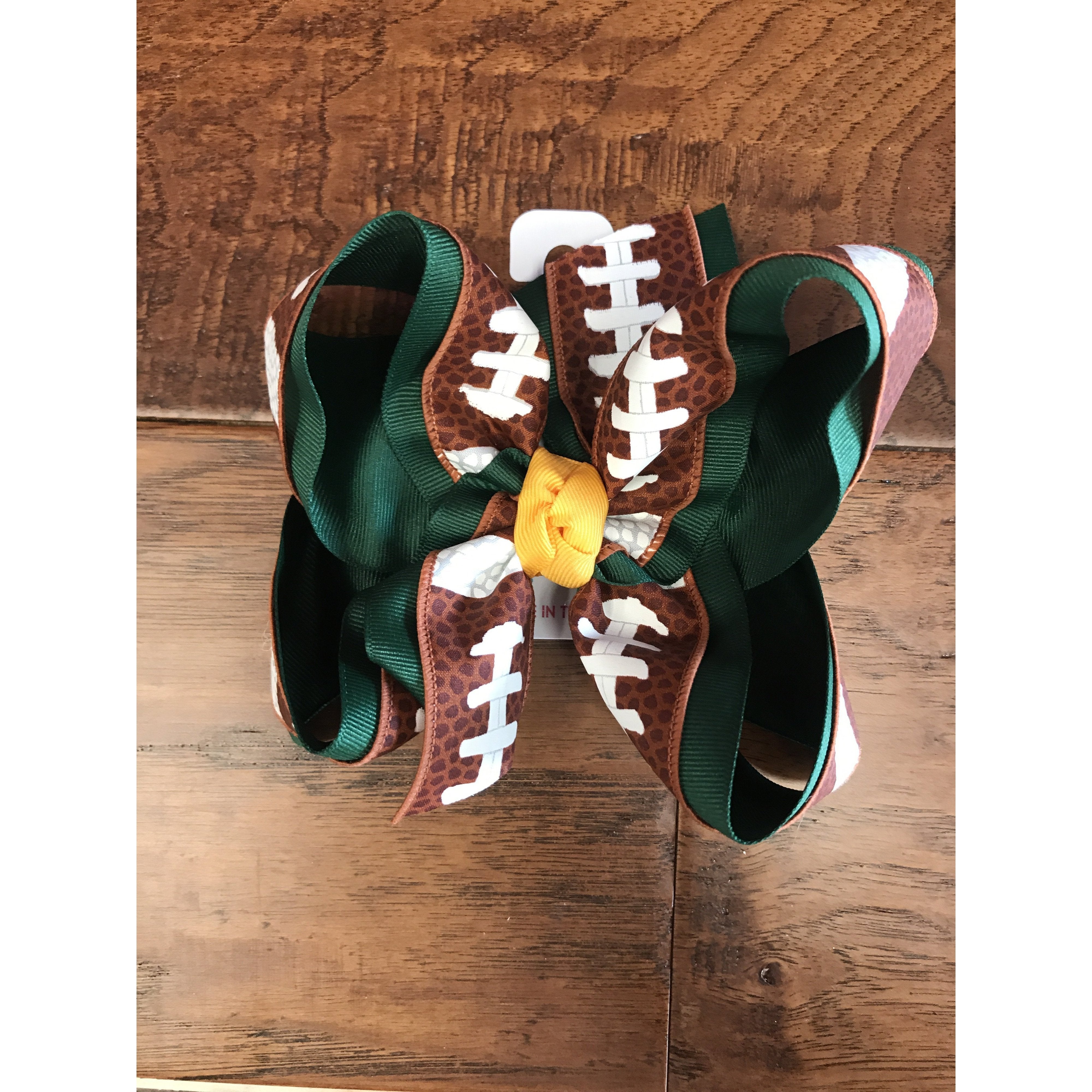 Beyond Creations Football Bow with Knot on French Clip in Assorted Colors