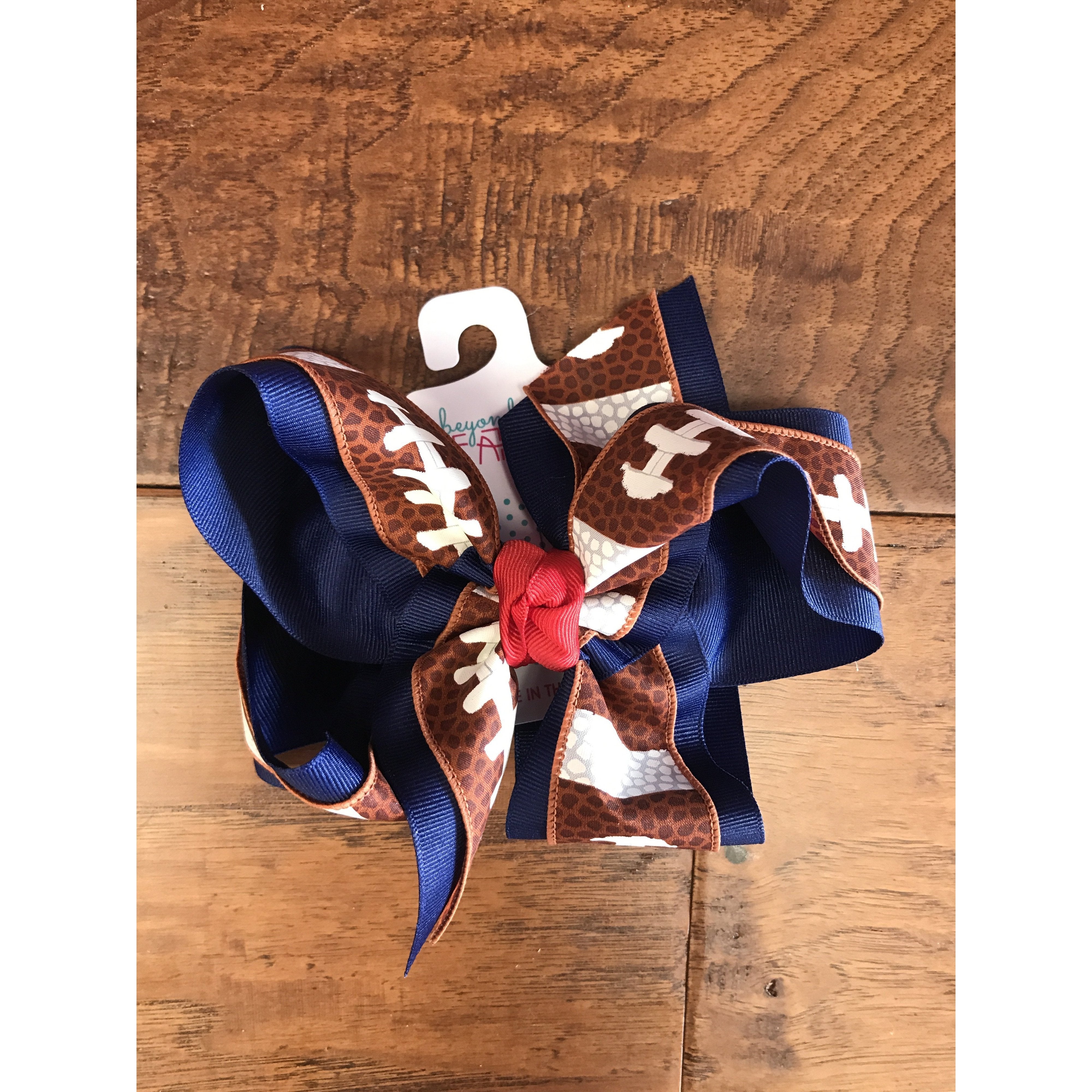 Beyond Creations Football Bow with Knot on French Clip in Assorted Colors