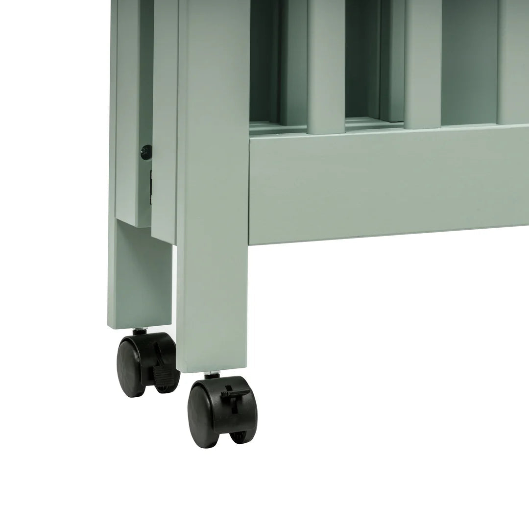 Babyletto Light Sage Origami Portable Mini Crib for Modern Families
