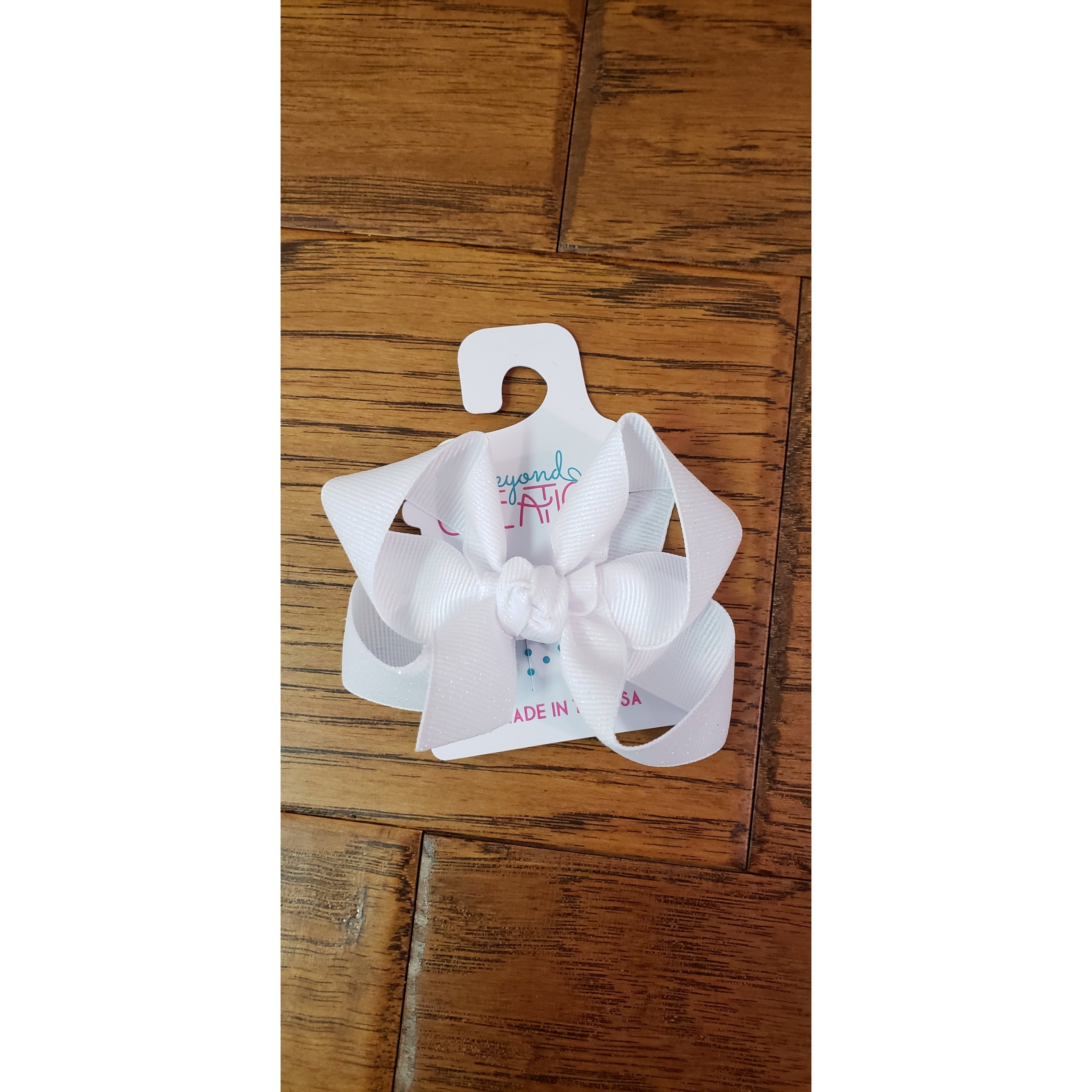 Medium-Sized Beyond Creations FDM Bow with Knot and Fairy Dust
